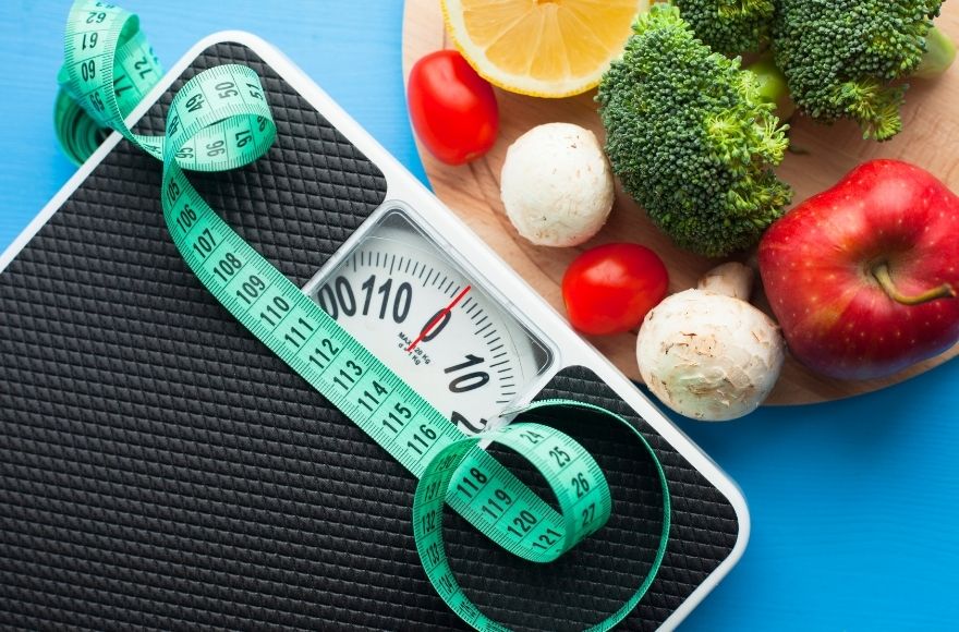 image of scales, tape measure and fruit and veg